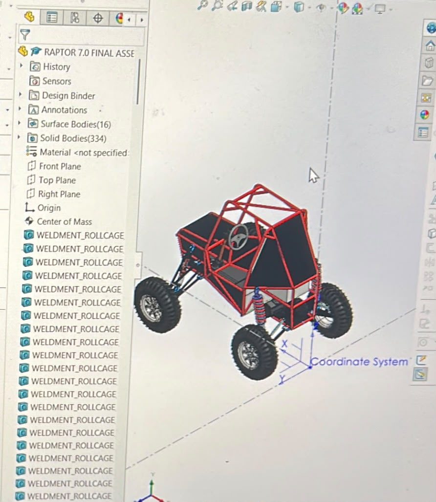 Full vehicle assembly open in SolidWorks with the feature tree visible